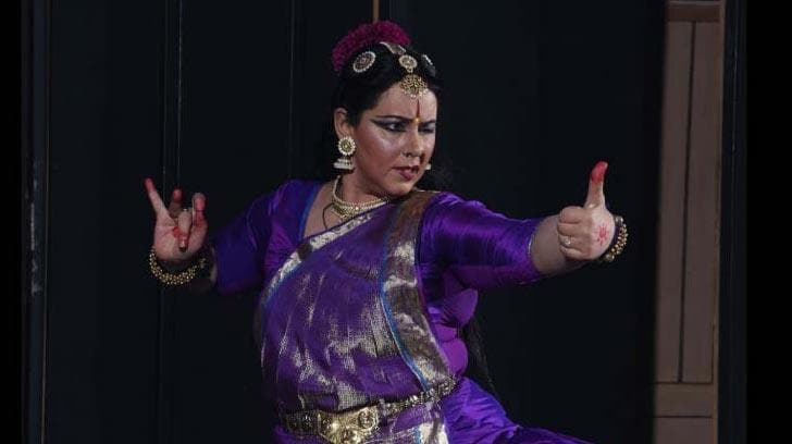 Dimple Kaur performing Aatm Rati in a purple costume